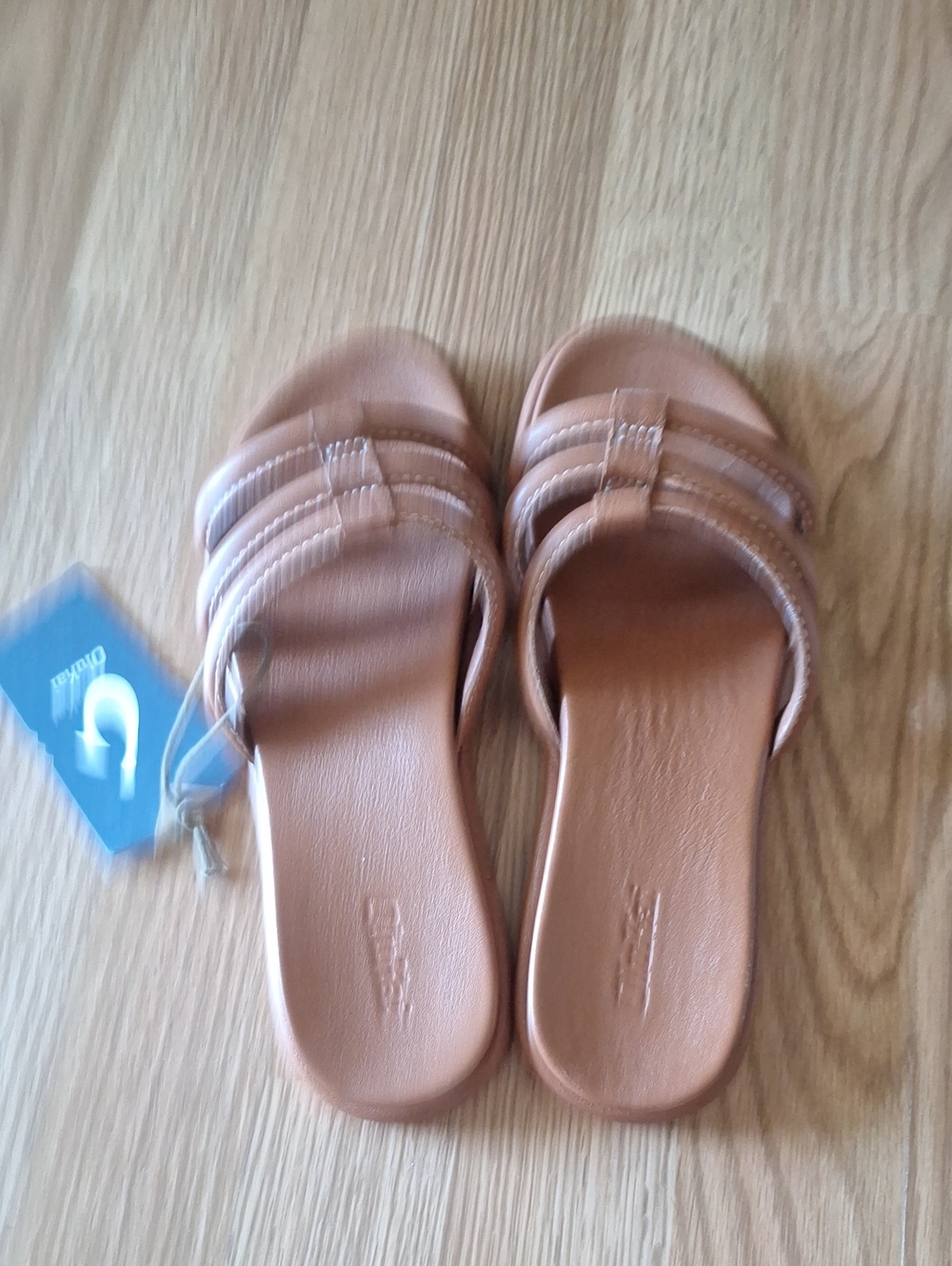 OluKai Women’s Triple-Strap Slide Sandals in Tan